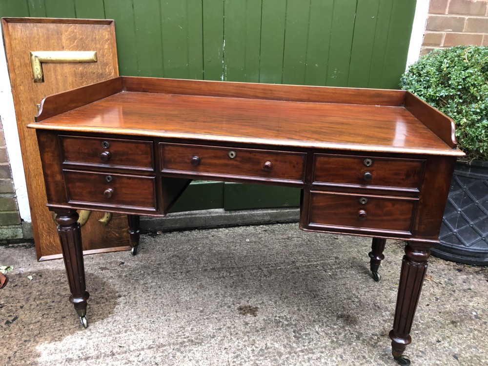 Early C19th George IV period mahogany kneehole writing table in the manner of Gillows of Lancaster and London. View XXII
