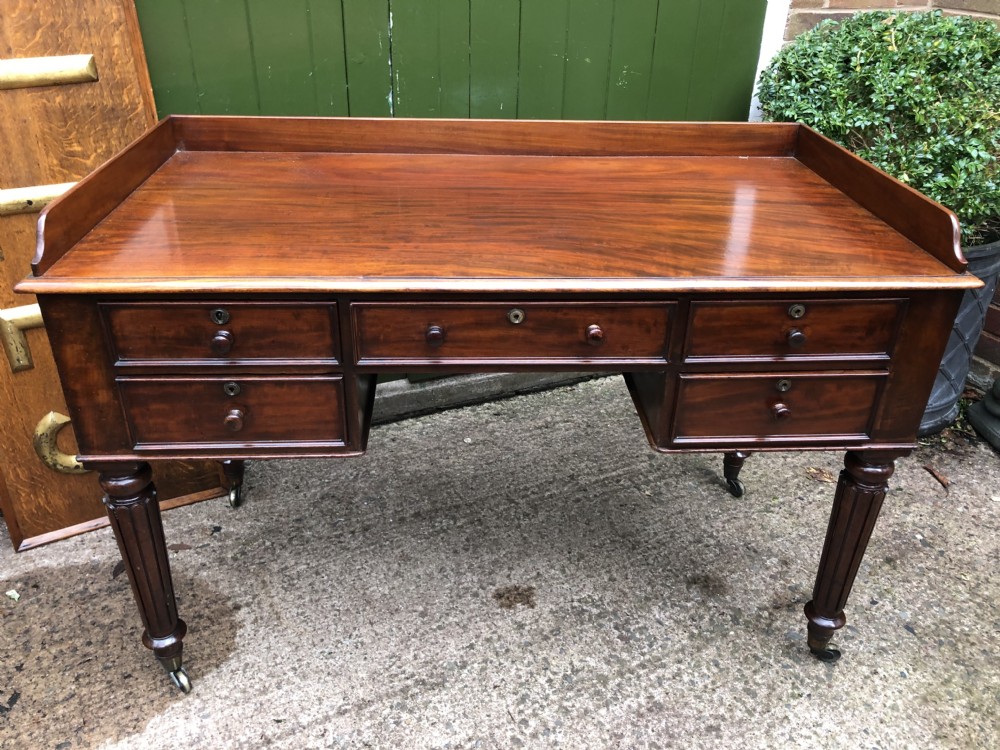 Early C19th George IV period mahogany kneehole writing table in the manner of Gillows of Lancaster and London. View XXIII