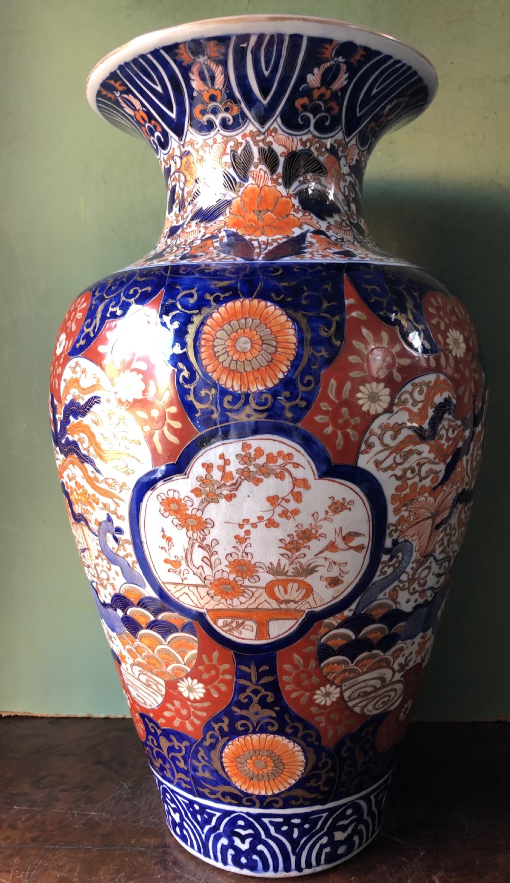 Mid C19th Japanese porcelain vase decorated in the Imari pattern and palette.