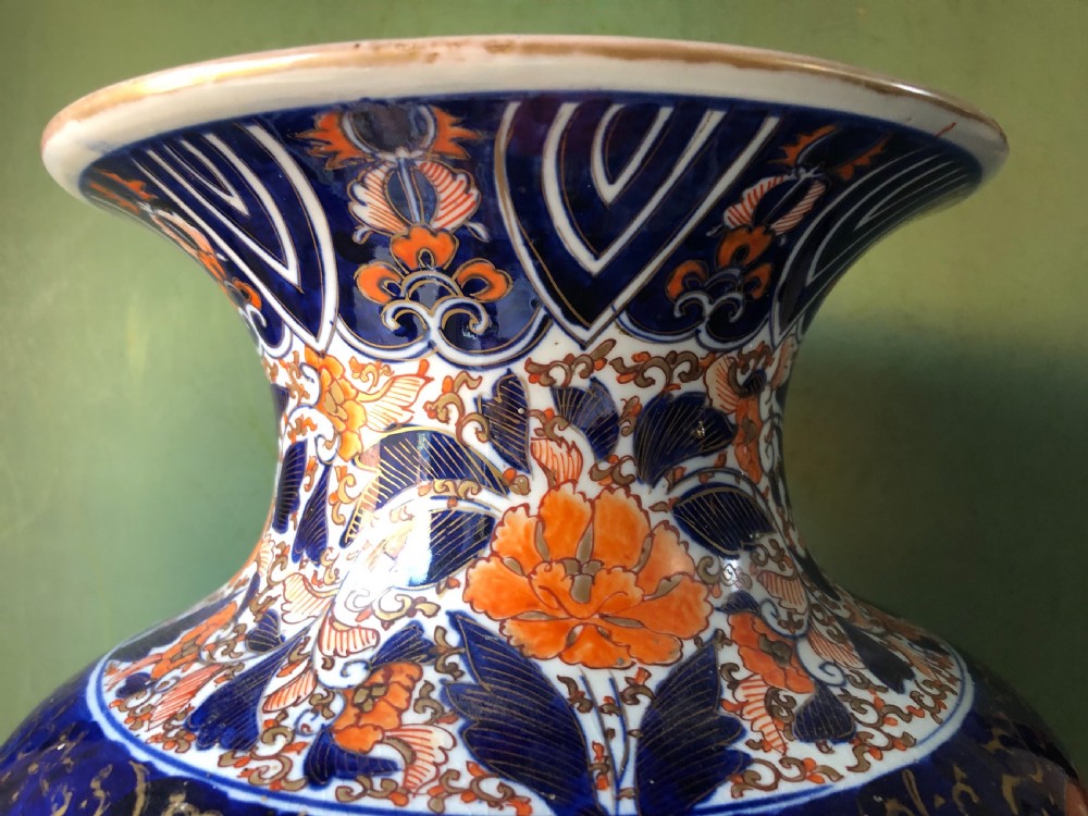 Mid C19th Japanese porcelain vase decorated in the Imari pattern and palette. View VII