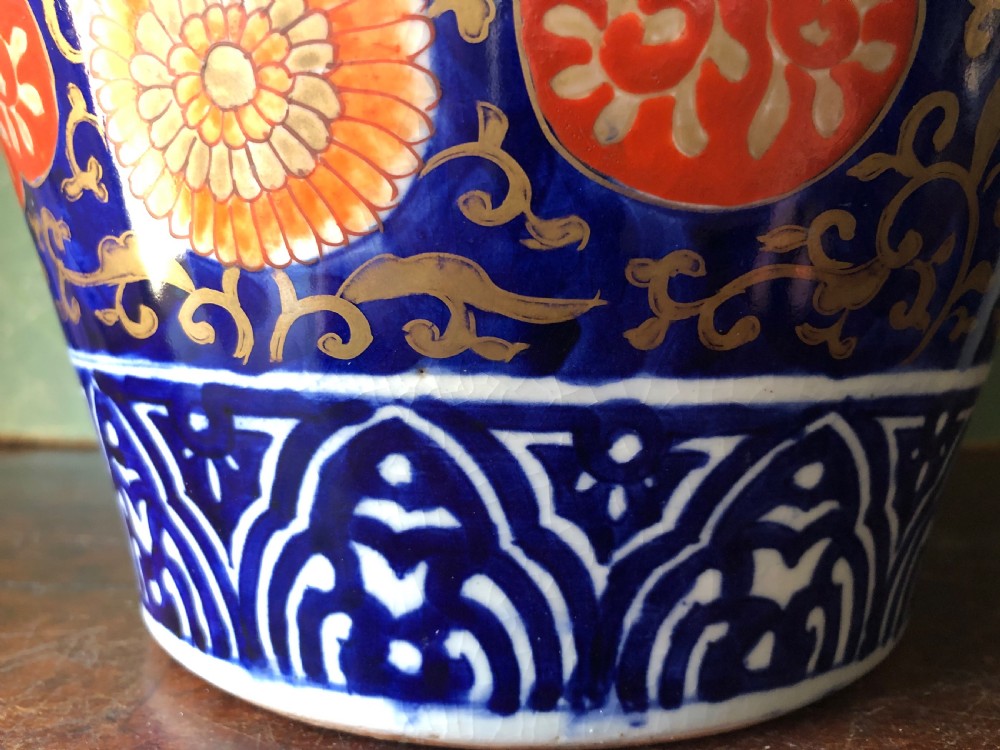 Mid C19th Japanese porcelain vase decorated in the Imari pattern and palette. View IX