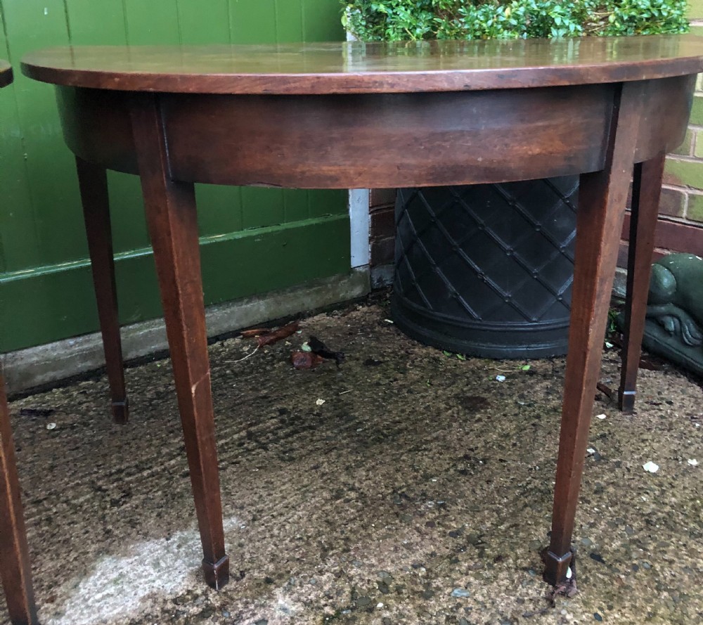 Pair of C18th George III period Cuban mahogany demi-lune tables . View IV