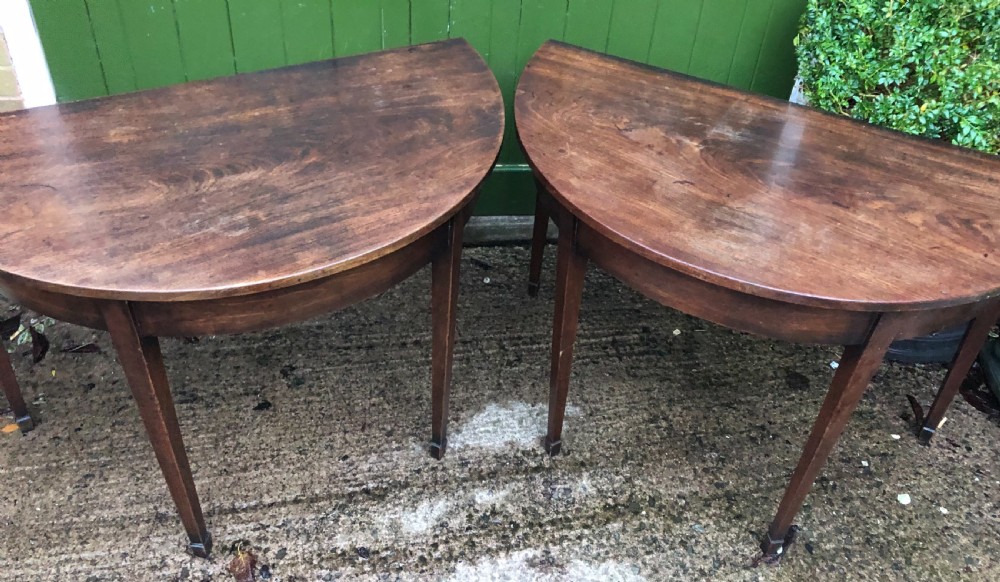 Pair of C18th George III period Cuban mahogany demi-lune tables . View VII