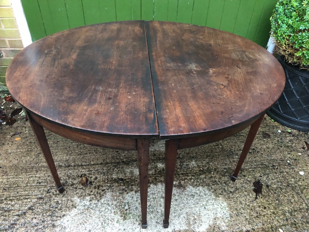 Pair of C18th George III period Cuban mahogany demi-lune tables . View X