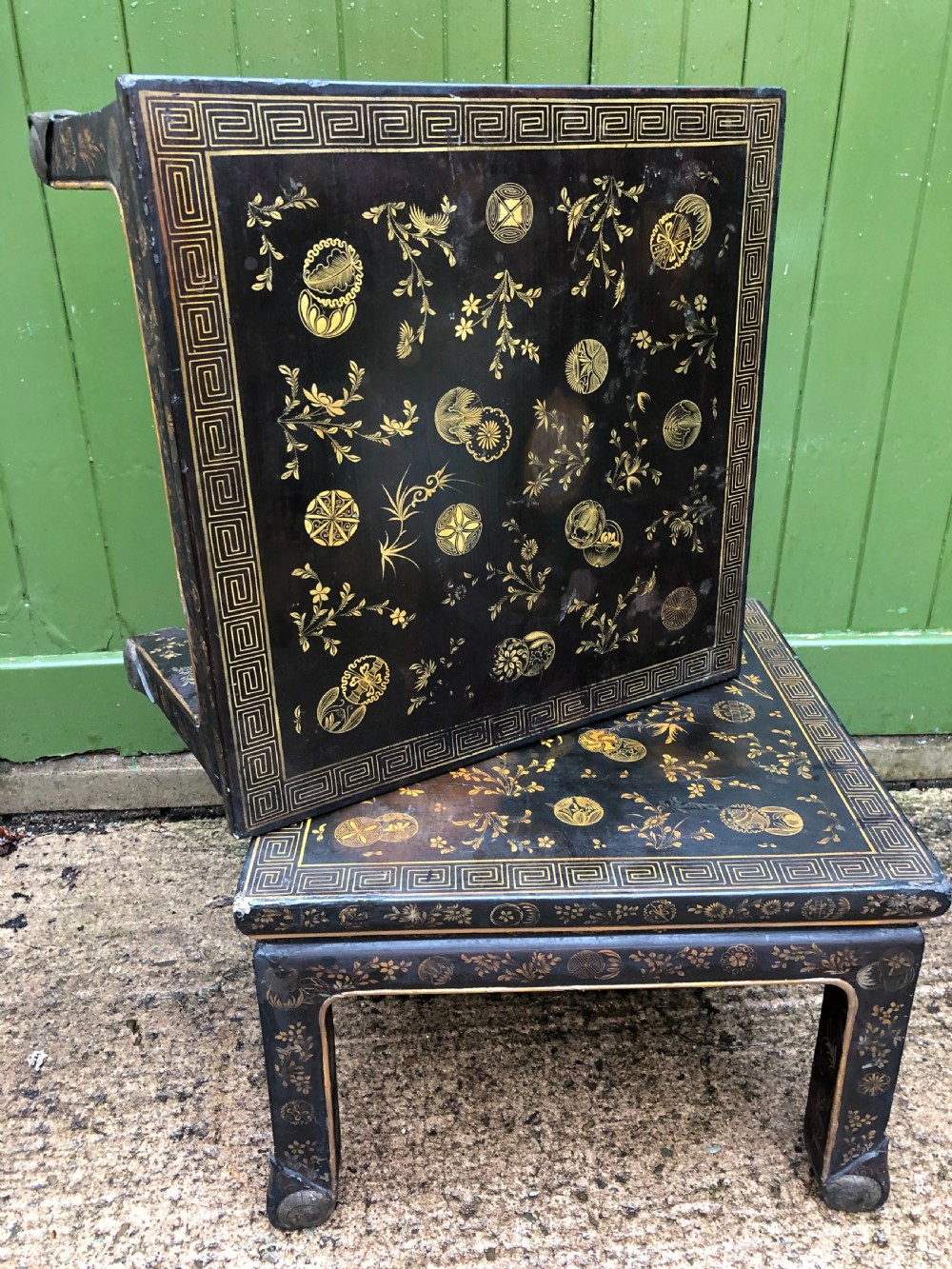 Pair of early C20th Japanese black and gilt lacquer square low tables . View IX