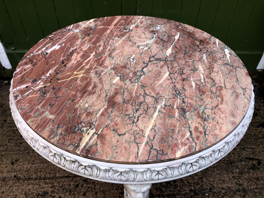 Late C19th decorated circular carved carved table with marble top on ancient Roman style lion monopodia supports. View X