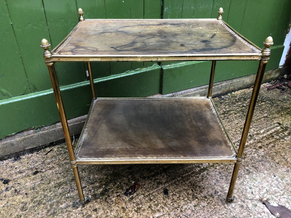 Early C20th brass-framed 2-tier rectangular etagere with tooled leather shelves . View II