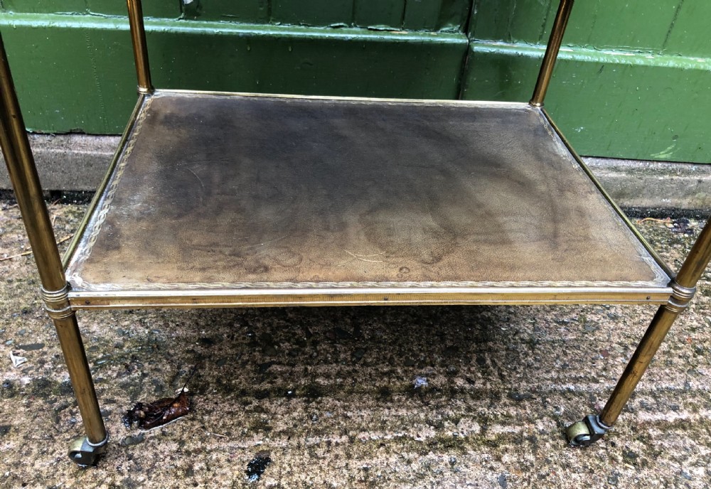 Early C20th brass-framed 2-tier rectangular etagere with tooled leather shelves . View IX