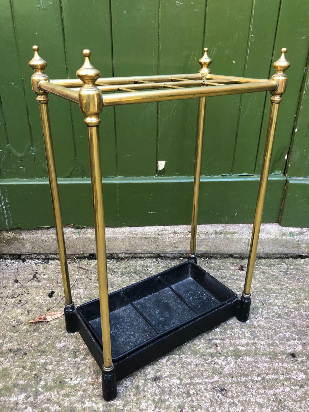 Late C19th Victorian period brass-framed stick or umbrella stand with cast-iron base.