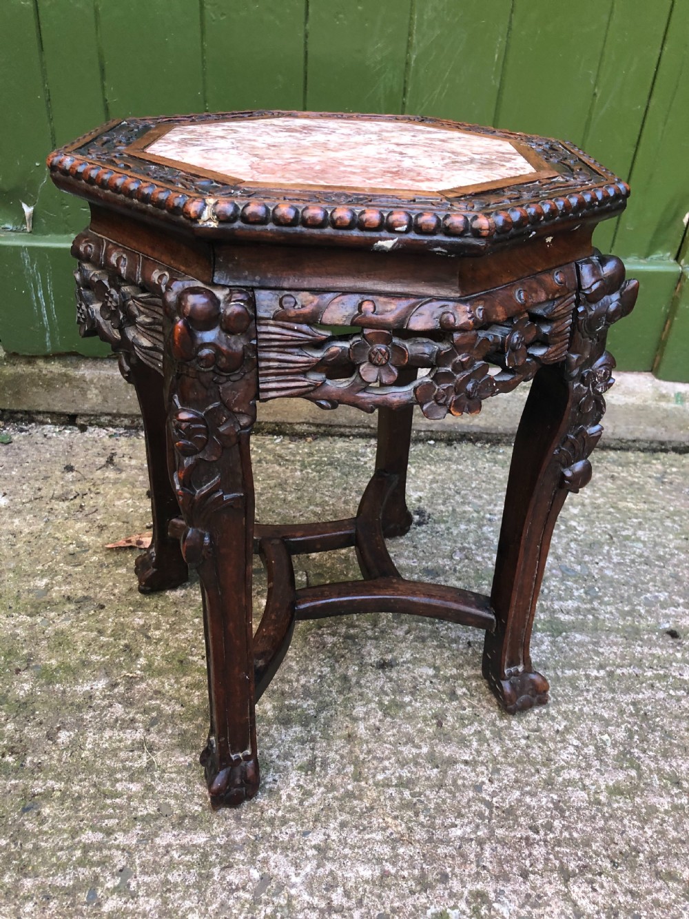 Late C19th Chinese Qing Dynasty carved hardwood inset rouge marble top low stand . View III