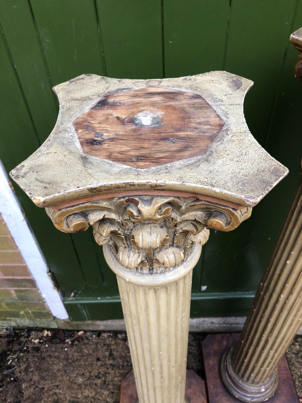 Pair of decorated early C19th carved wooden classical fluted columns with Corinthian capitals . View II