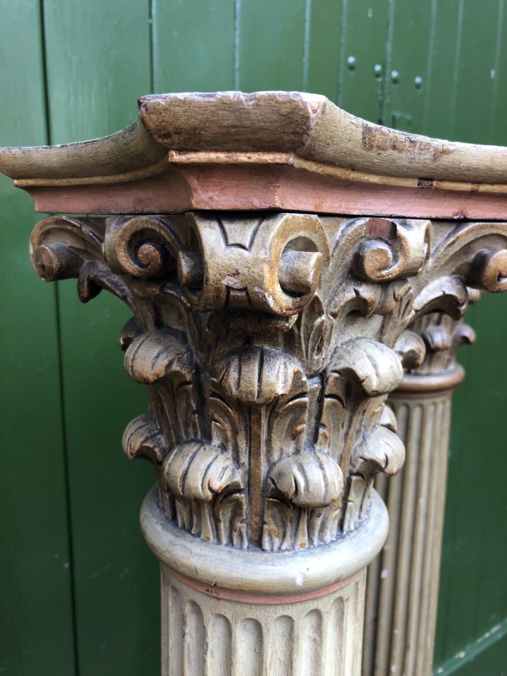 Pair of decorated early C19th carved wooden classical fluted columns with Corinthian capitals . View V