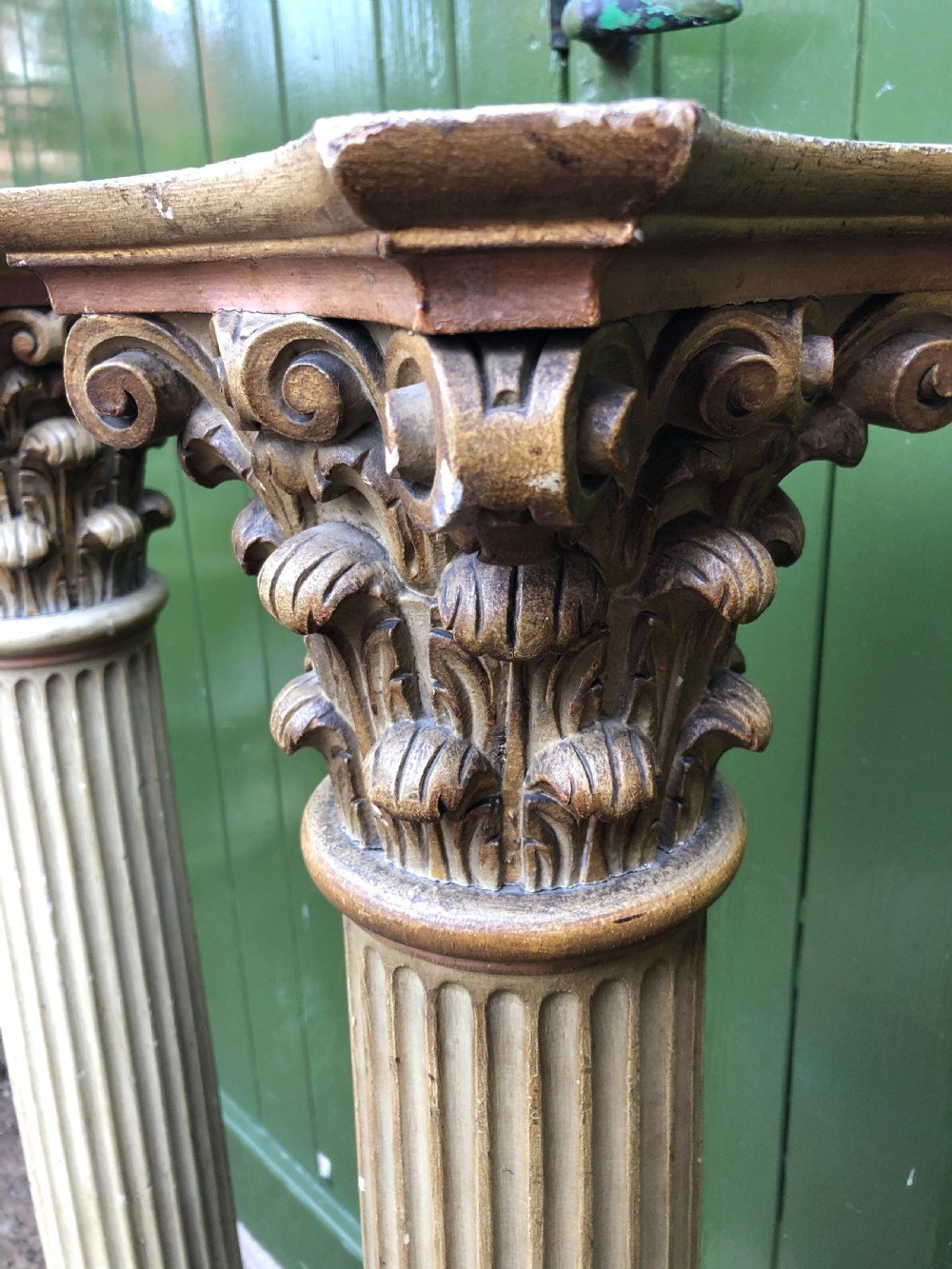 Pair of decorated early C19th carved wooden classical fluted columns with Corinthian capitals . View X
