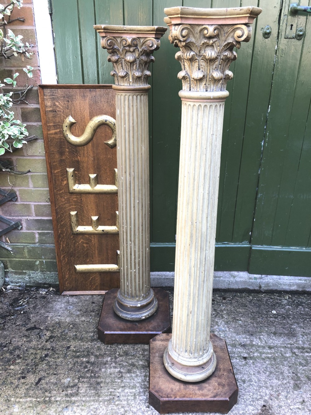 Pair of decorated early C19th carved wooden classical fluted columns with Corinthian capitals . View VI