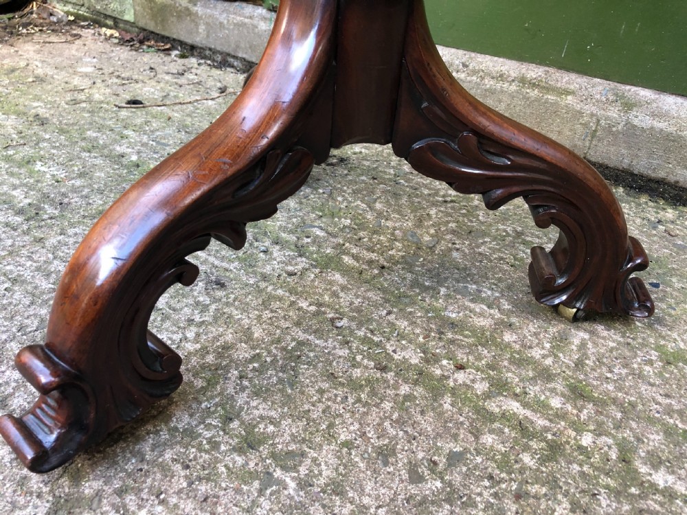 Mid C19th mahogany table with shaped top on carved tripod base in the manner of Gillows of Lancaster. View III
