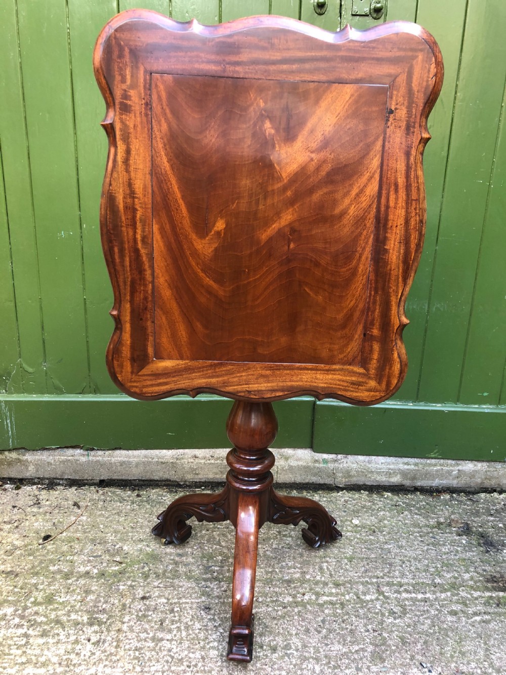Mid C19th mahogany table with shaped top on carved tripod base in the manner of Gillows of Lancaster. View V