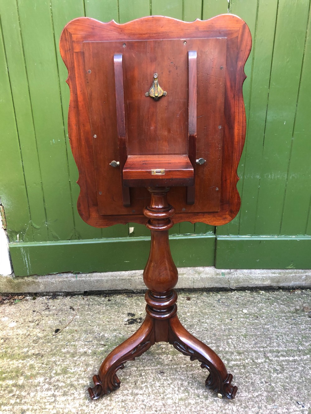 Mid C19th mahogany table with shaped top on carved tripod base in the manner of Gillows of Lancaster. View VI
