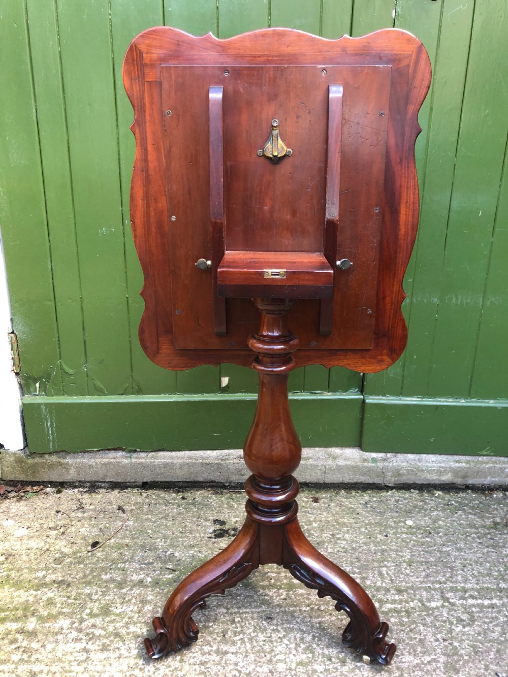 Mid C19th mahogany table with shaped top on carved tripod base in the manner of Gillows of Lancaster. View XI