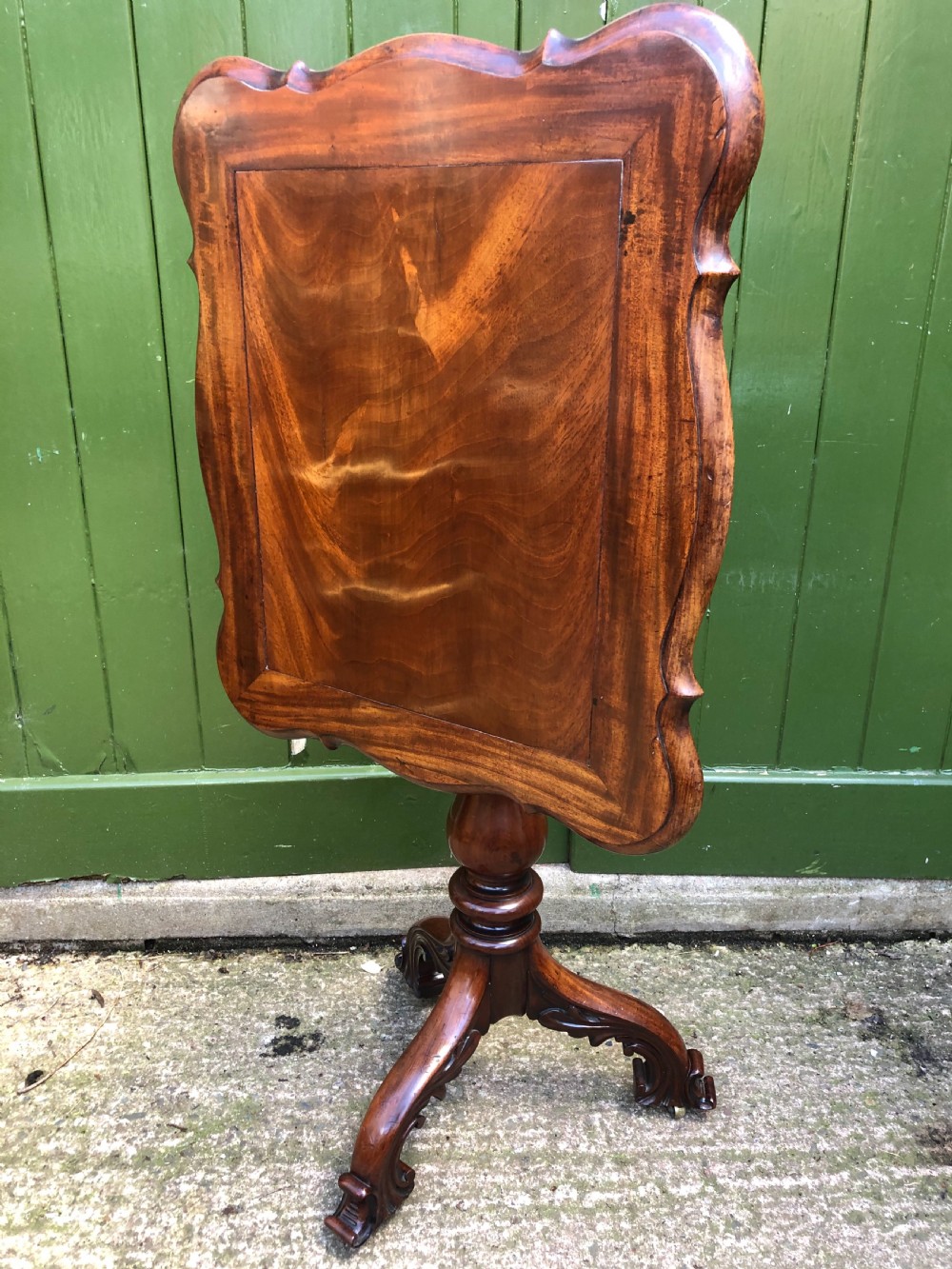 Mid C19th mahogany table with shaped top on carved tripod base in the manner of Gillows of Lancaster. View XIII