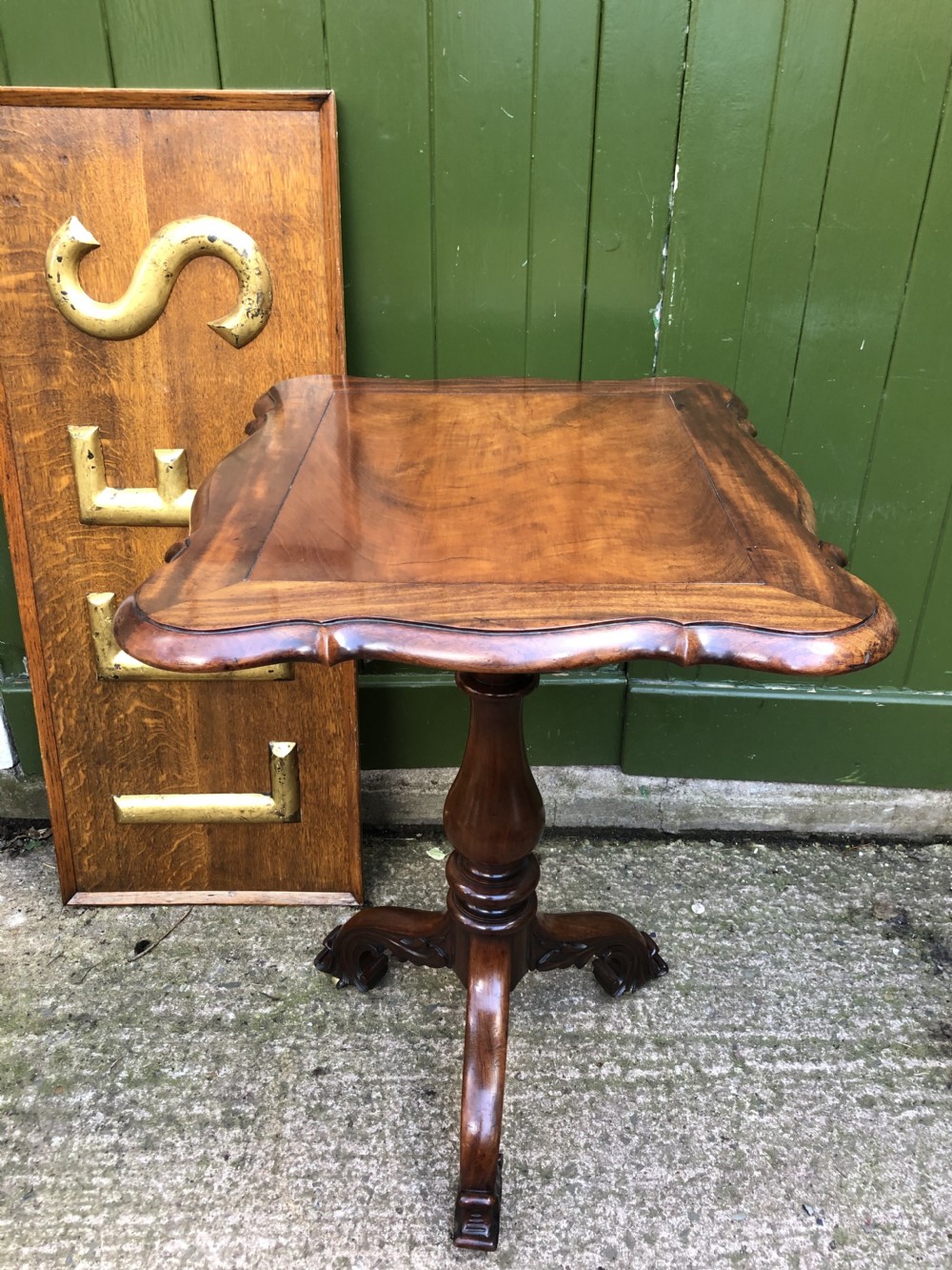 Mid C19th mahogany table with shaped top on carved tripod base in the manner of Gillows of Lancaster. View XVI