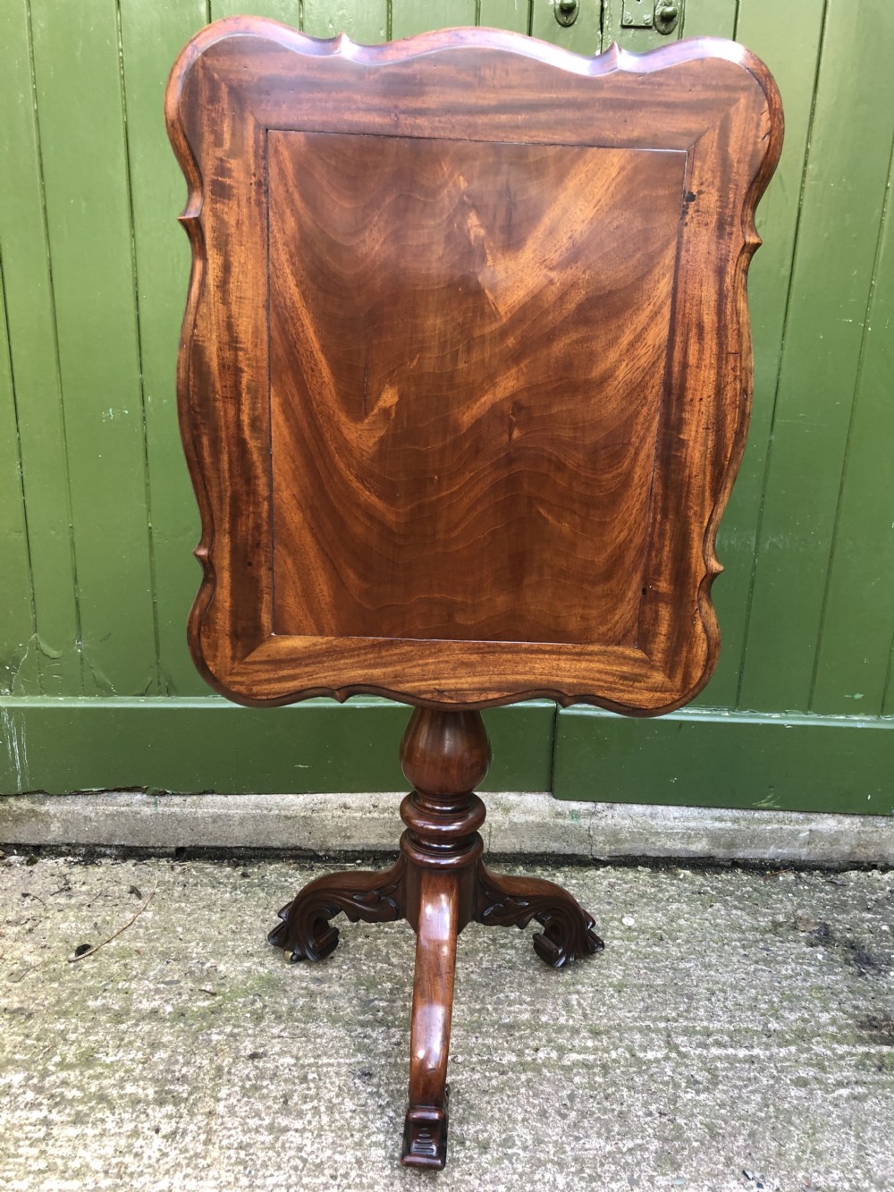 Mid C19th mahogany table with shaped top on carved tripod base in the manner of Gillows of Lancaster. View XIX