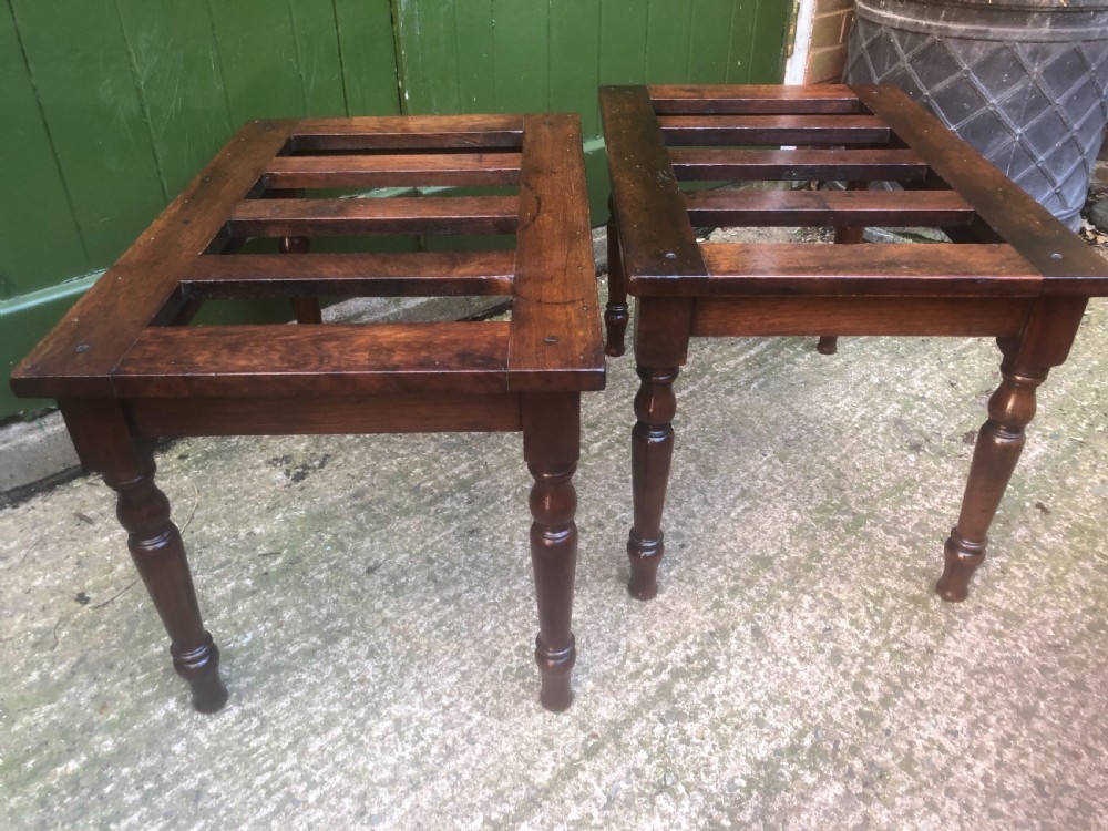 Scarce pair of mid C19th mahogany slatted-top luggage stands . View II