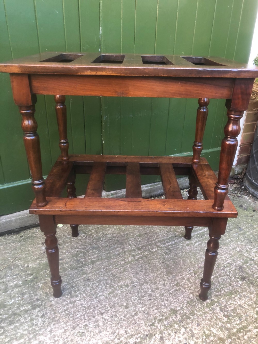 Scarce pair of mid C19th mahogany slatted-top luggage stands . View VI