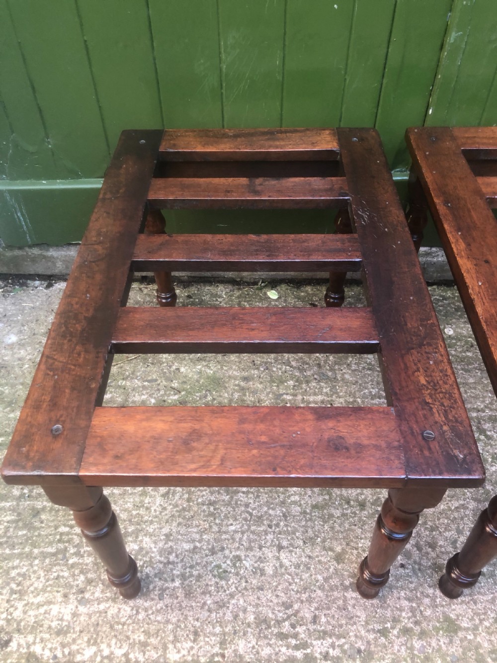 Scarce pair of mid C19th mahogany slatted-top luggage stands . View XII