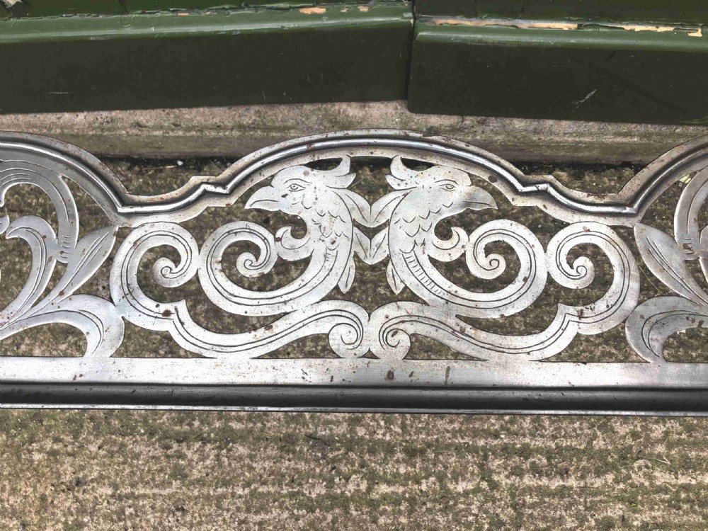 Highly decorative C19th cut-steel fire-place guard or fender in the mid C18th Georgian period revival style . View IV