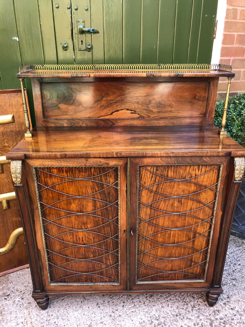 Fine quality early C19th Regency period rosewood and gilt brass-mounted chiffonier.
 View X