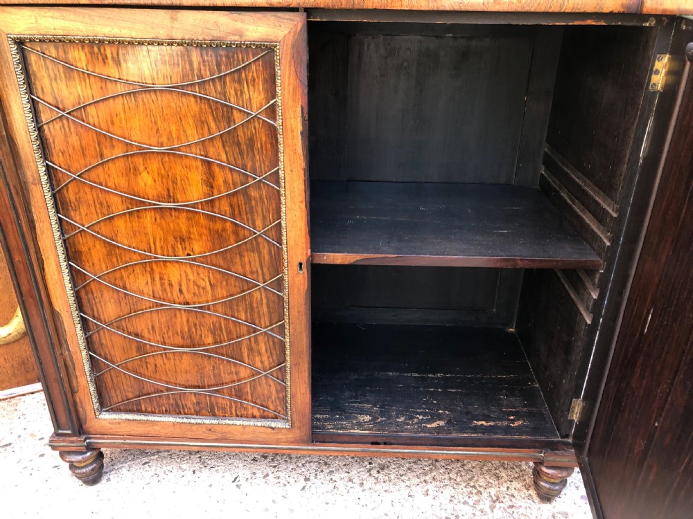 Fine quality early C19th Regency period rosewood and gilt brass-mounted chiffonier.
 View XII