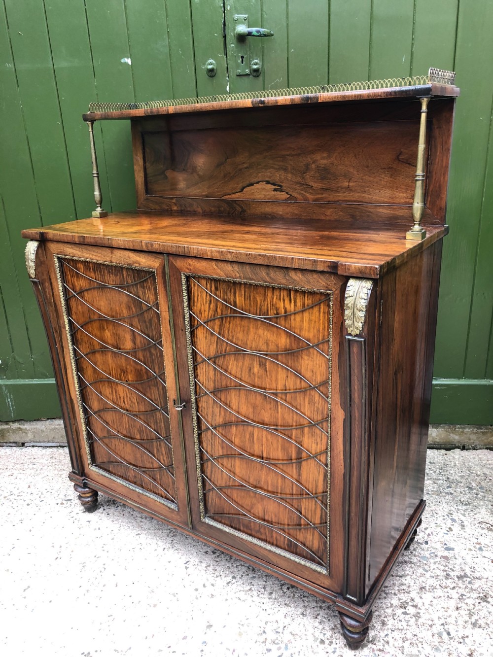 Fine quality early C19th Regency period rosewood and gilt brass-mounted chiffonier.
 View XIX