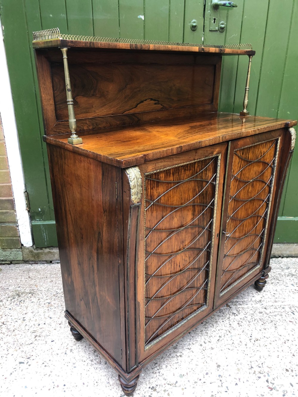Fine quality early C19th Regency period rosewood and gilt brass-mounted chiffonier.
 View XX