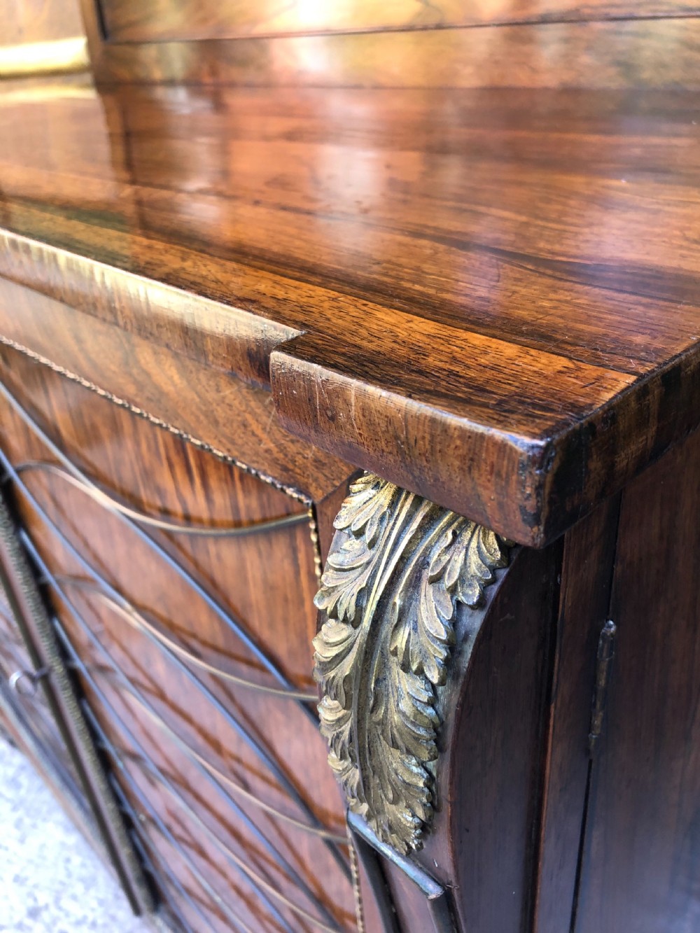 Fine quality early C19th Regency period rosewood and gilt brass-mounted chiffonier.
 View XXVI
