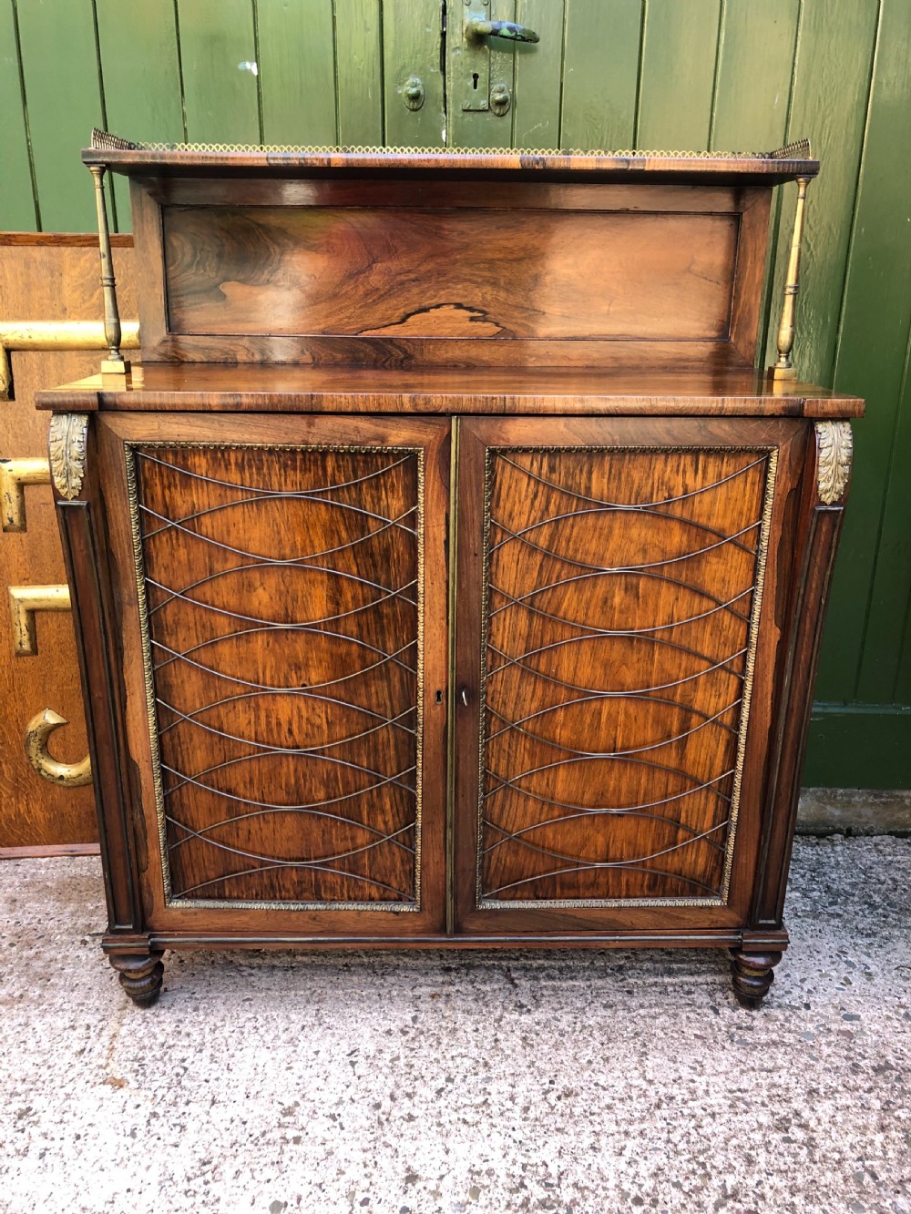 Fine quality early C19th Regency period rosewood and gilt brass-mounted chiffonier.
 View XXVIII