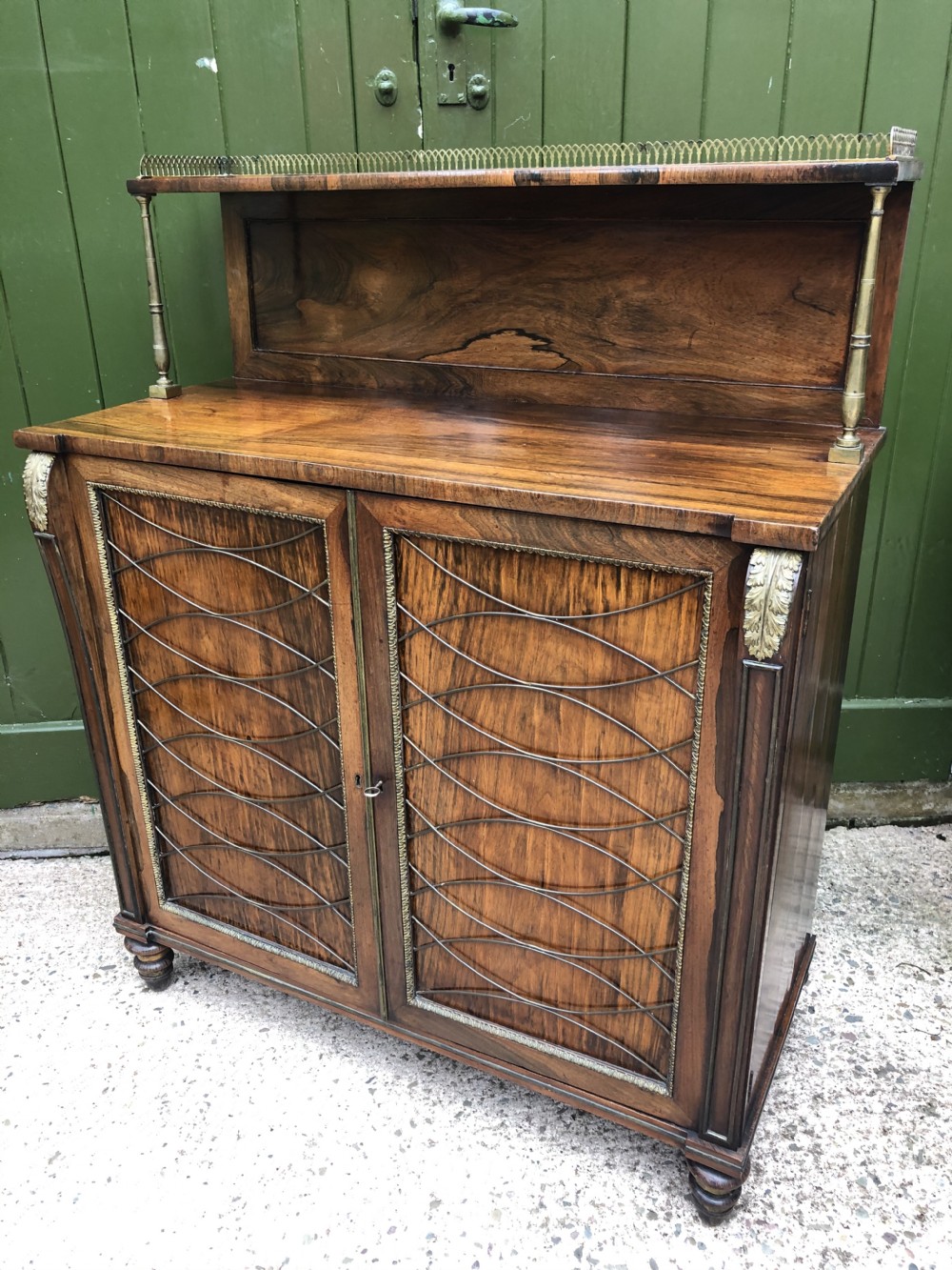 Fine quality early C19th Regency period rosewood and gilt brass-mounted chiffonier.
