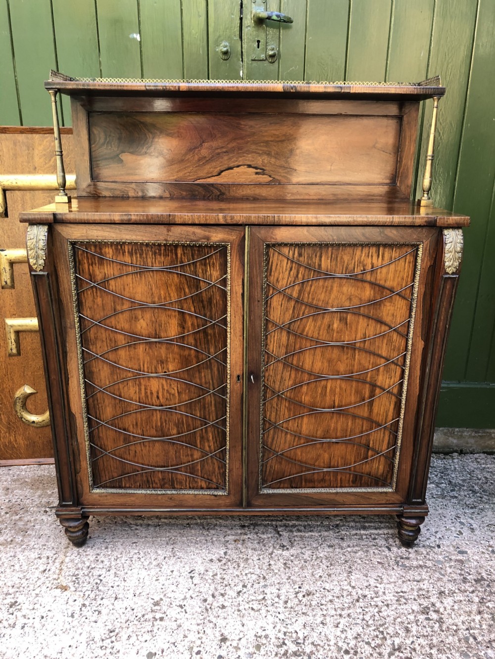 Fine quality early C19th Regency period rosewood and gilt brass-mounted chiffonier.
 View XXXI