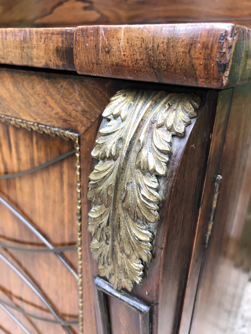 Fine quality early C19th Regency period rosewood and gilt brass-mounted chiffonier.
 View VII