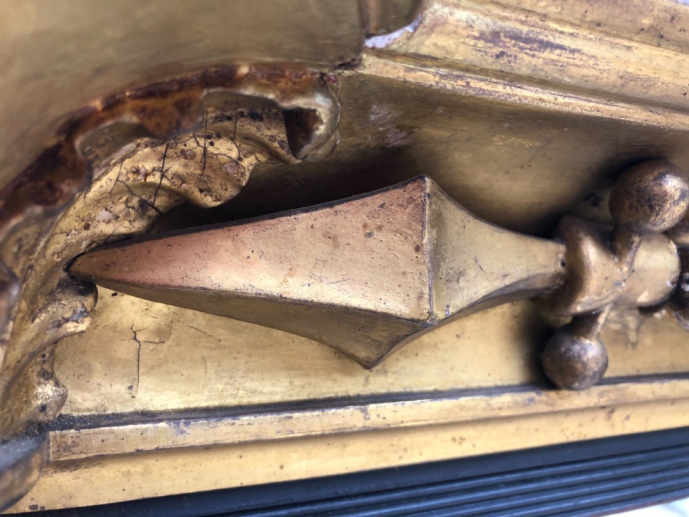 Early C19th Regency period carved giltwood overmantel mirror of practical scale and proportions. View IV