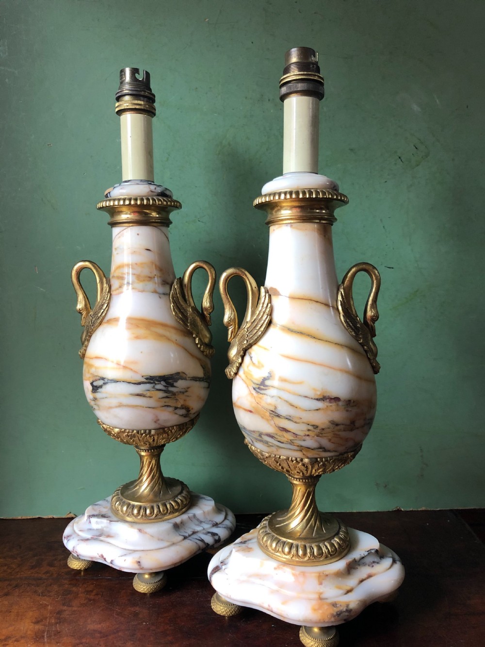 Pair of early C20th French marble and ormolu-mounted lamp bases in the Louis XVI style .