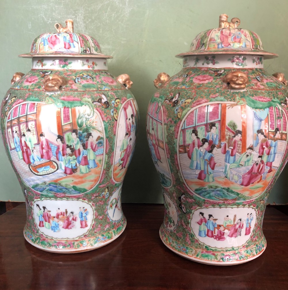 Pair of C19th Chinese Cantonese porcelain ‘famille rose’ enamel decorated vases and covers .