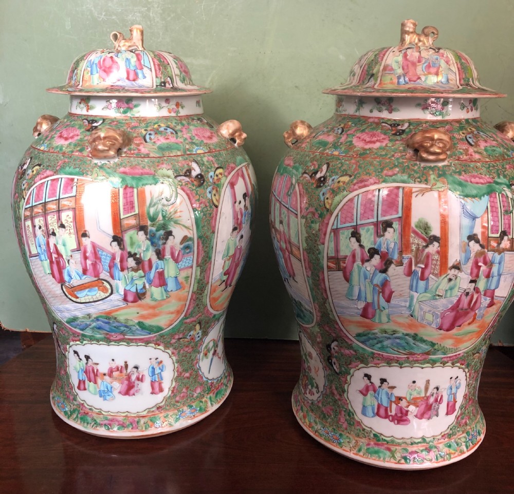 Pair of C19th Chinese Cantonese porcelain ‘famille rose’ enamel decorated vases and covers . View II