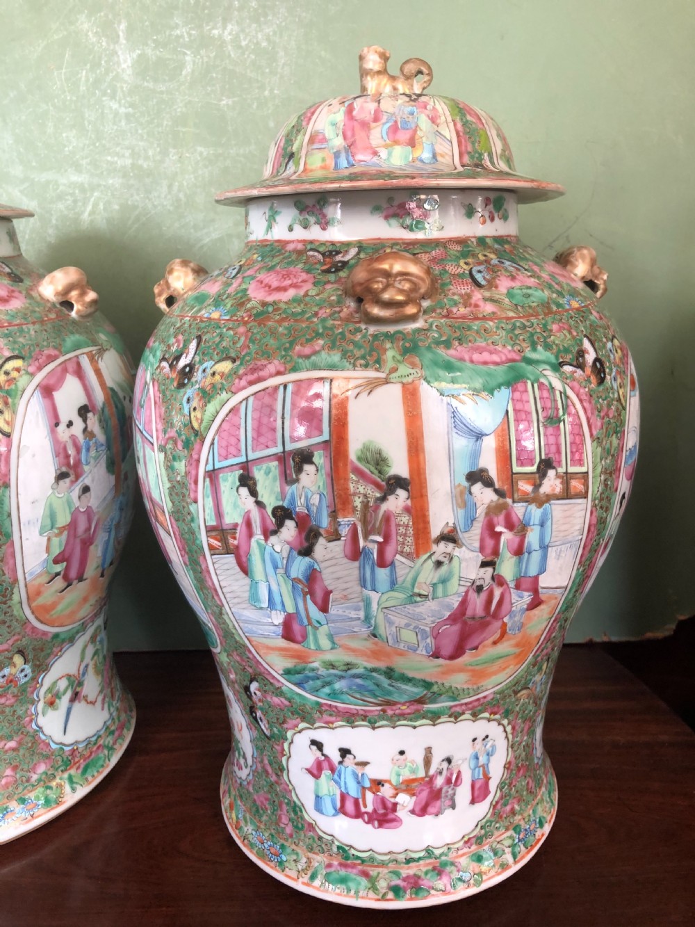 Pair of C19th Chinese Cantonese porcelain ‘famille rose’ enamel decorated vases and covers . View V