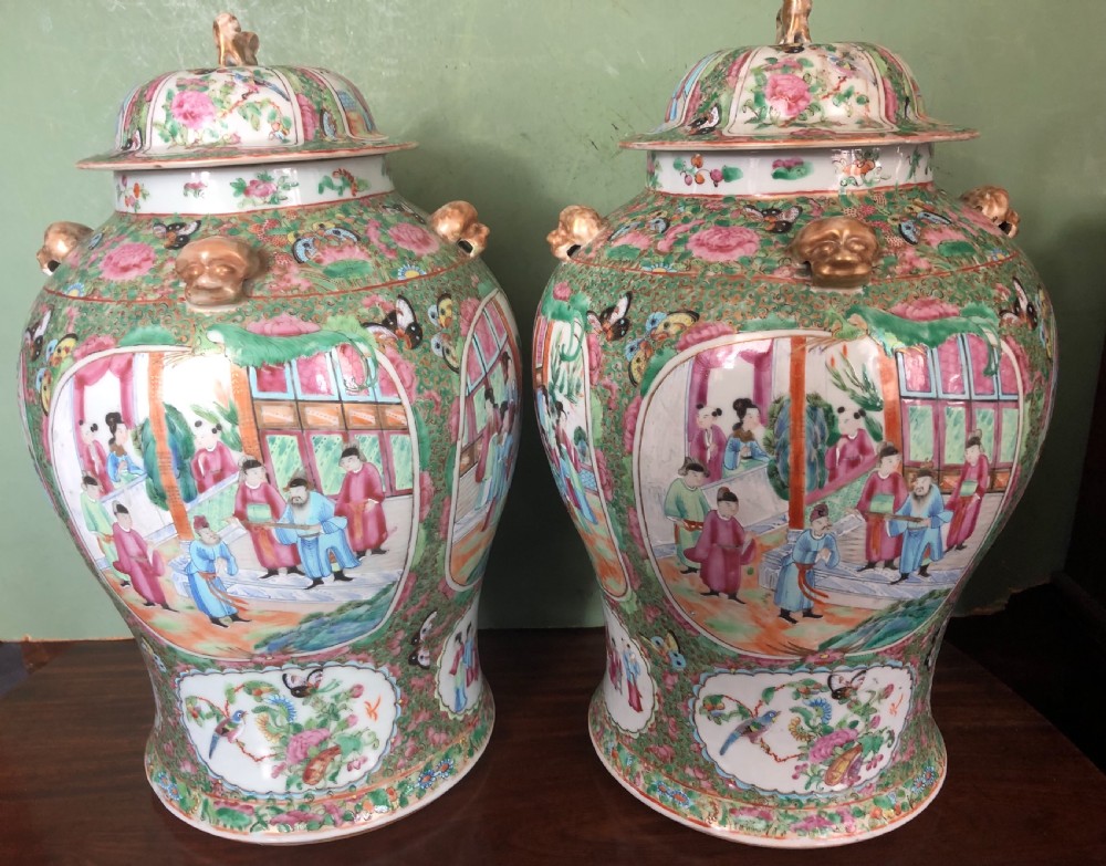 Pair of C19th Chinese Cantonese porcelain ‘famille rose’ enamel decorated vases and covers . View VIII