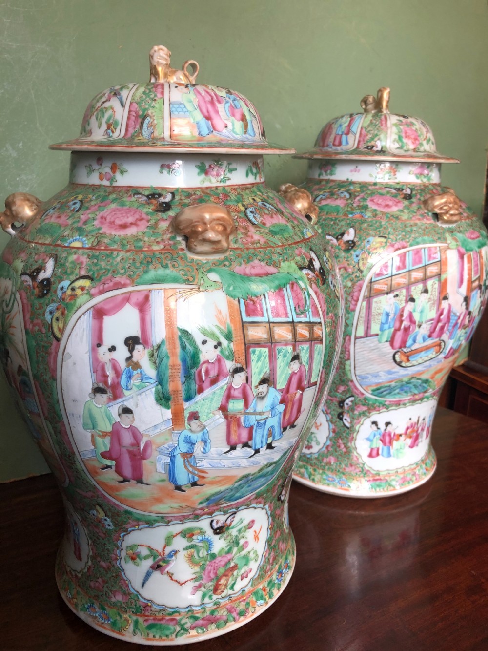 Pair of C19th Chinese Cantonese porcelain ‘famille rose’ enamel decorated vases and covers . View XIX