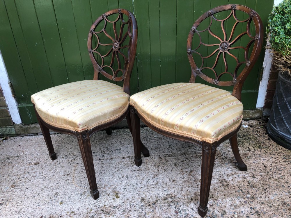 Pair of early C20th mahogany side chairs of C18th George III period design . View VIII