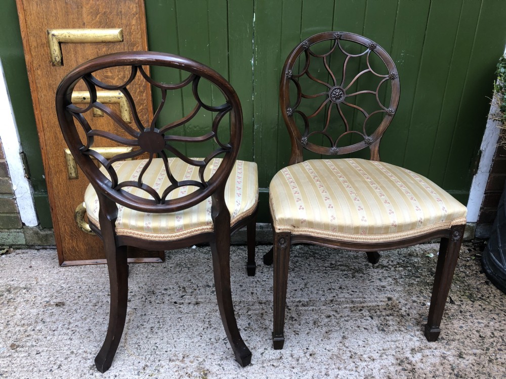 Pair of early C20th mahogany side chairs of C18th George III period design . View XIII