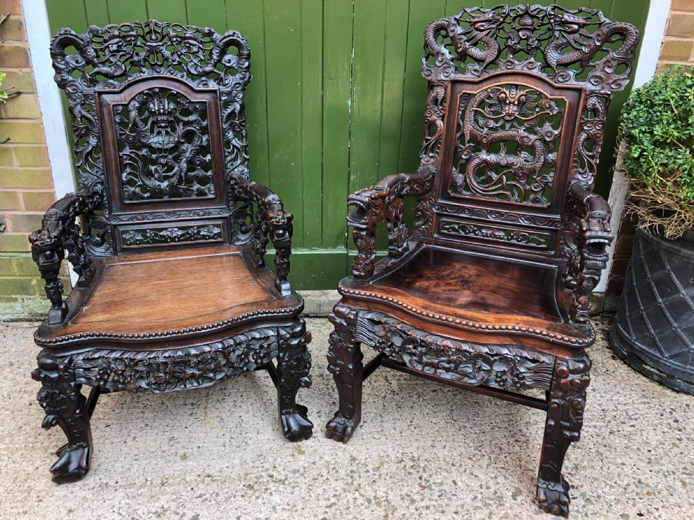 Magnificent ‘matched pair’ of late C19th Chinese Qing Dynasty carved hardwood ‘hongmu’  throne-style armchairs.
