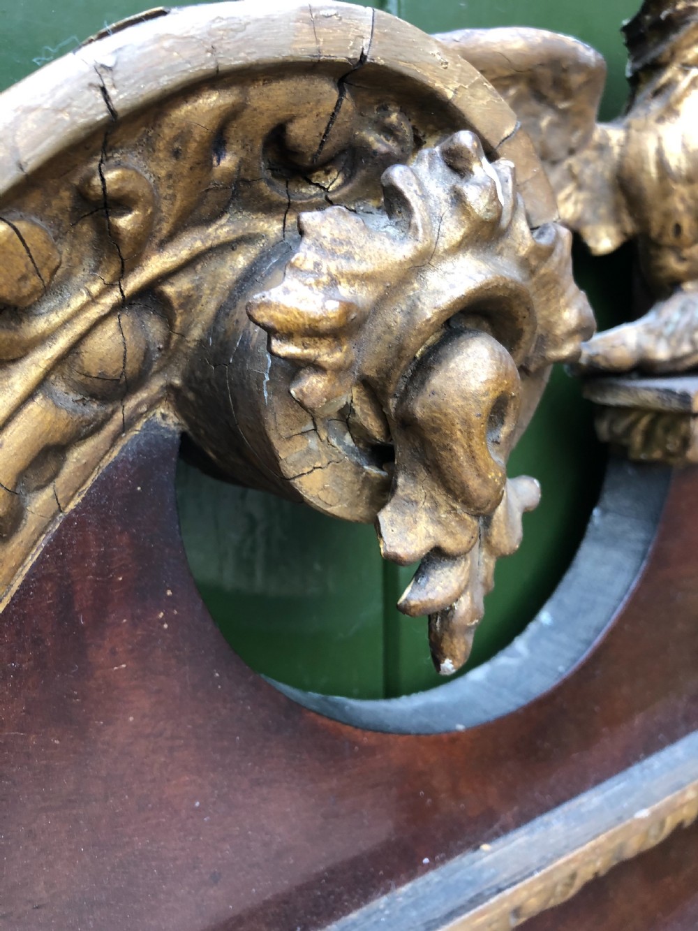 C19th George II period revival walnut and parcel-gilt framed mirror of impressive proportions. View IV
