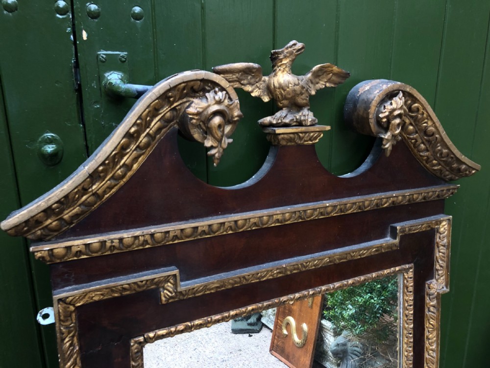 C19th George II period revival walnut and parcel-gilt framed mirror of impressive proportions. View VI